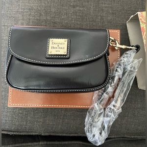 Dooney and Bourke black wristlet bag. NWT in box.